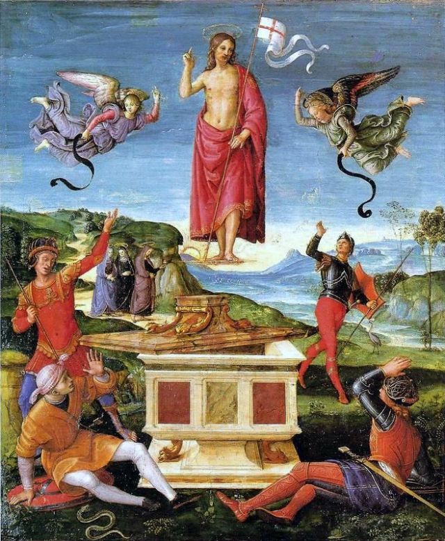 Due uomini di bianco vestiti si incontrano e si abbracciano